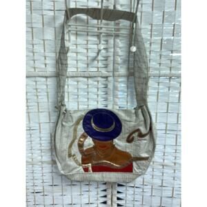 Dazzeling Handbag, featuring a Woman in‎ a Hat